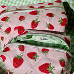 Load image into Gallery viewer, Two strawberry-patterned bags on a green checkered background
