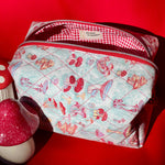 Load image into Gallery viewer, Fabric pouch with a pattern of mushrooms on a red background
